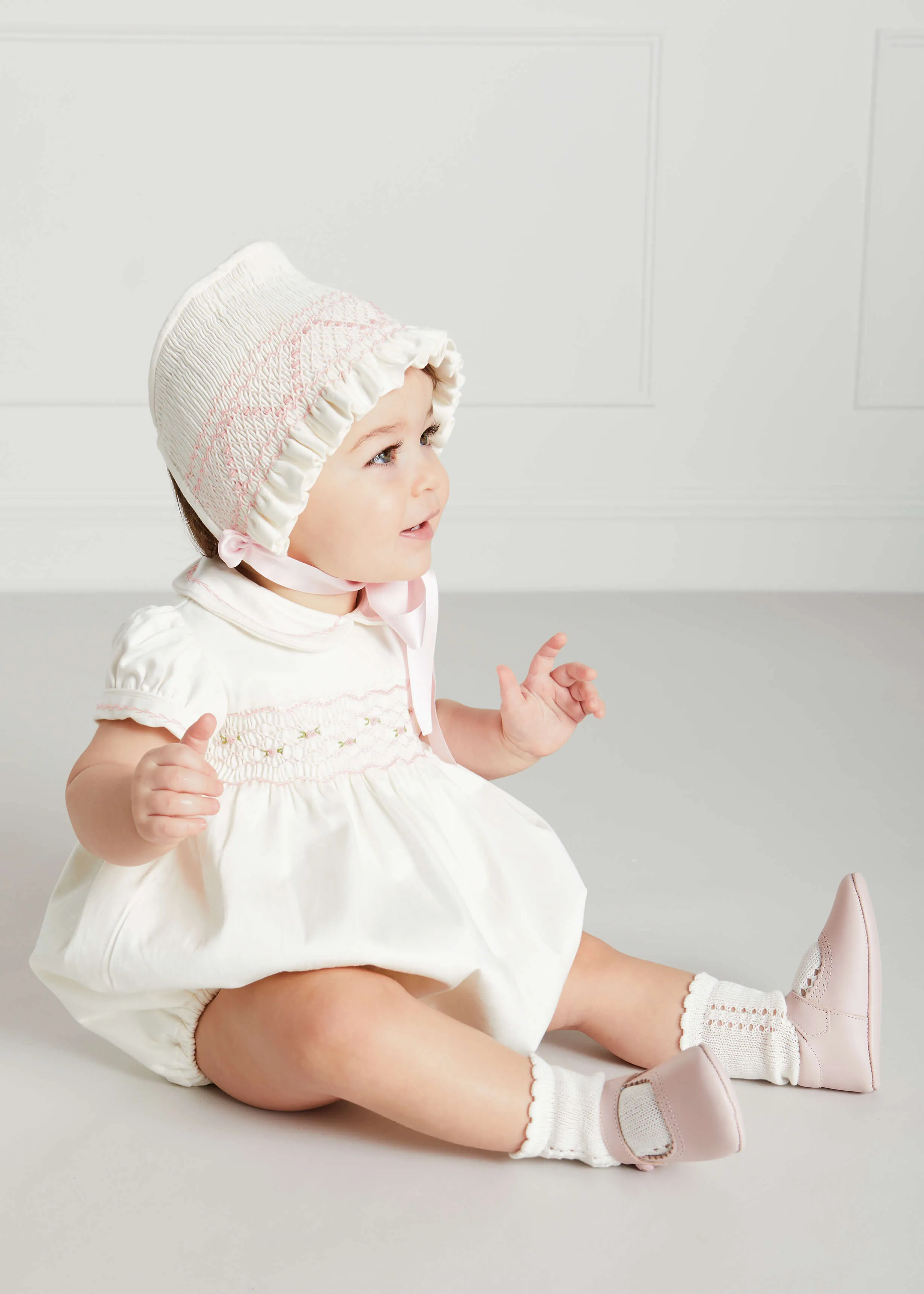 Classic Off-White Pink Hand Smocked Romper (3-18mths)