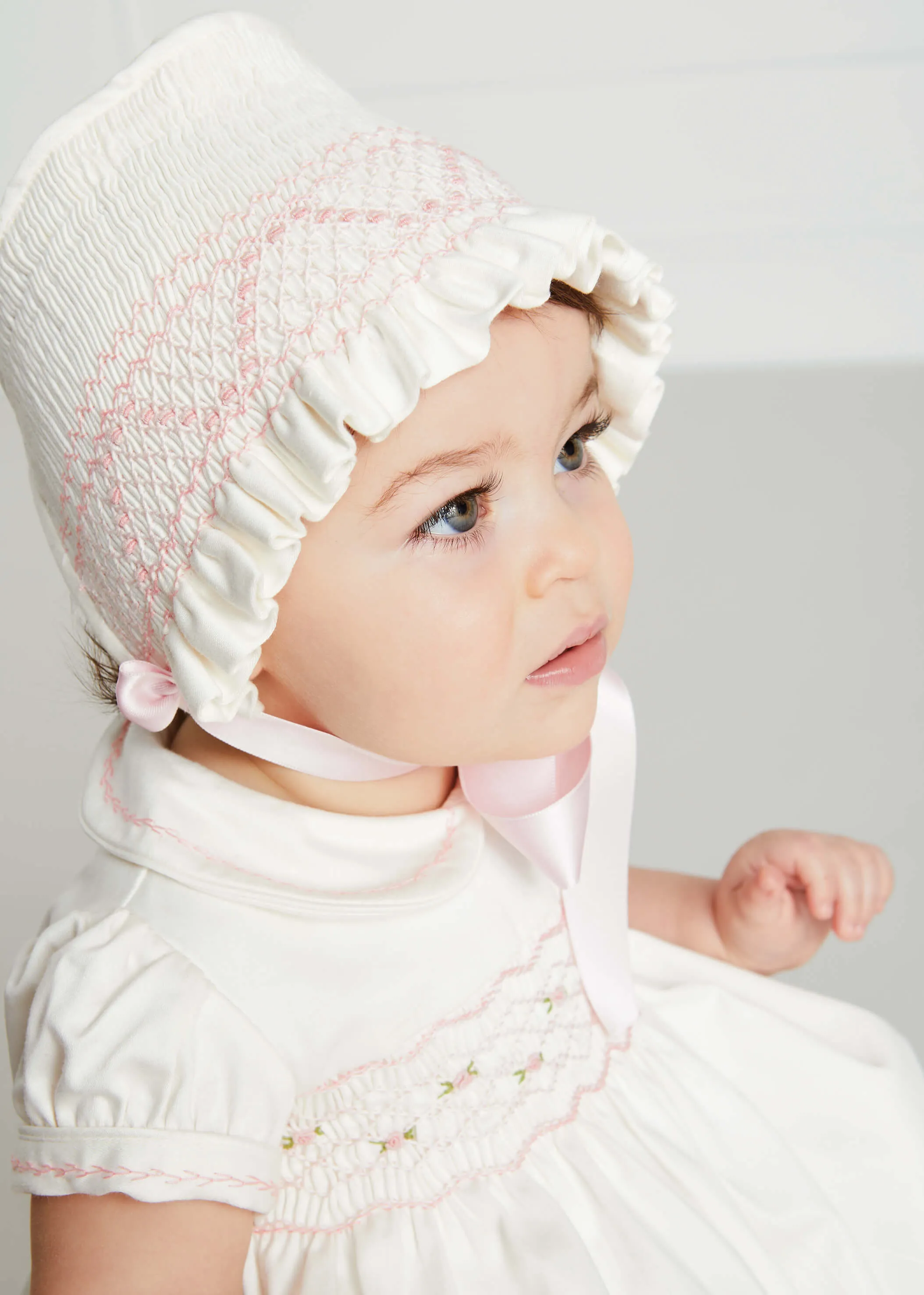 Classic Off-White Pink Hand Smocked Romper (3-18mths)