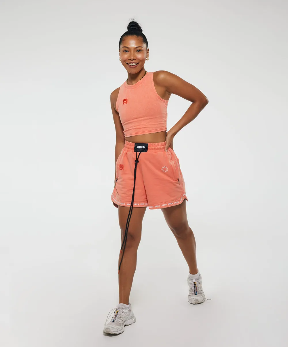 FLOW Mid Sweat Short in Coral Wash