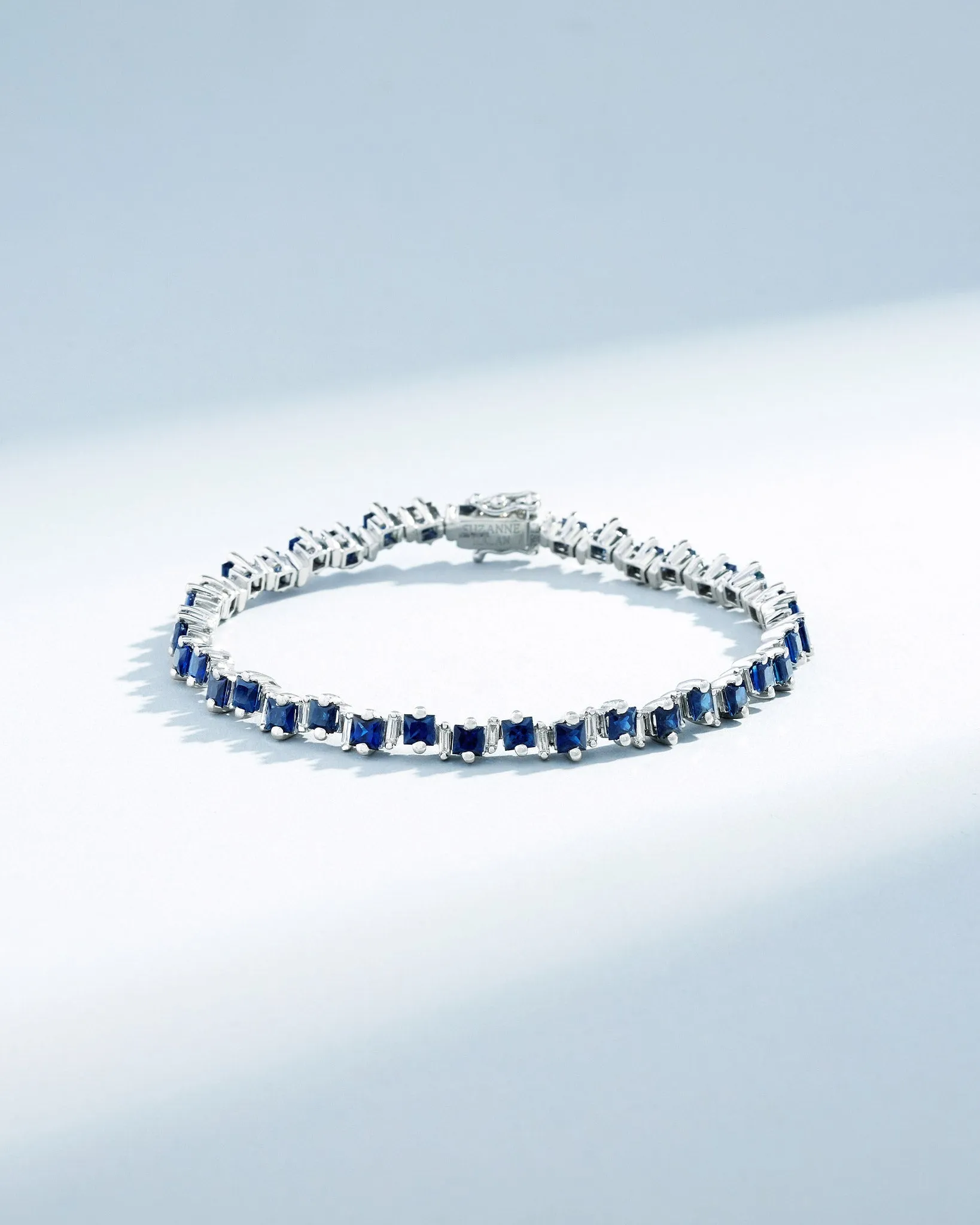 Princess Staggered Dark Blue Sapphire Tennis Bracelet